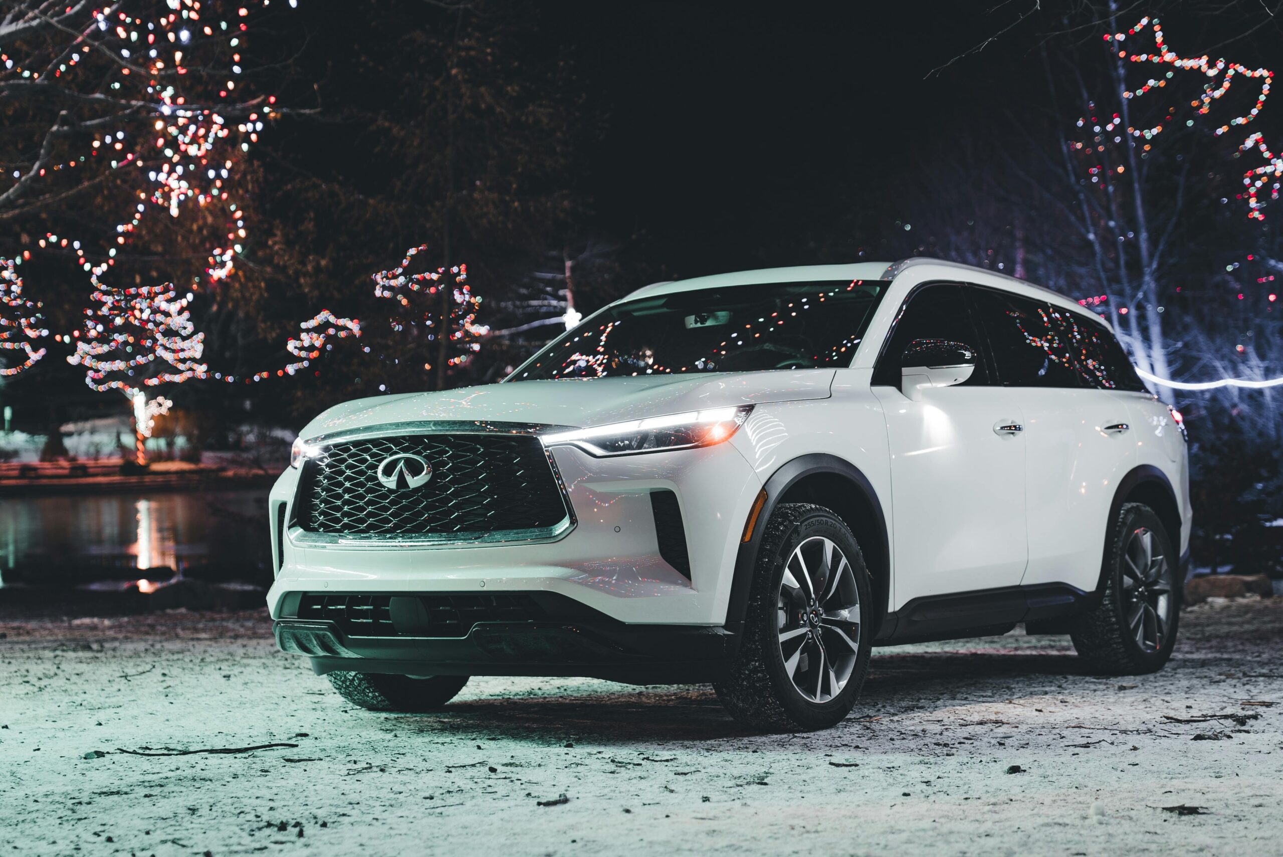 A modern Apple Taxis Gatwick vehicle with holiday decorations, offering a fixed-price airport transfer.